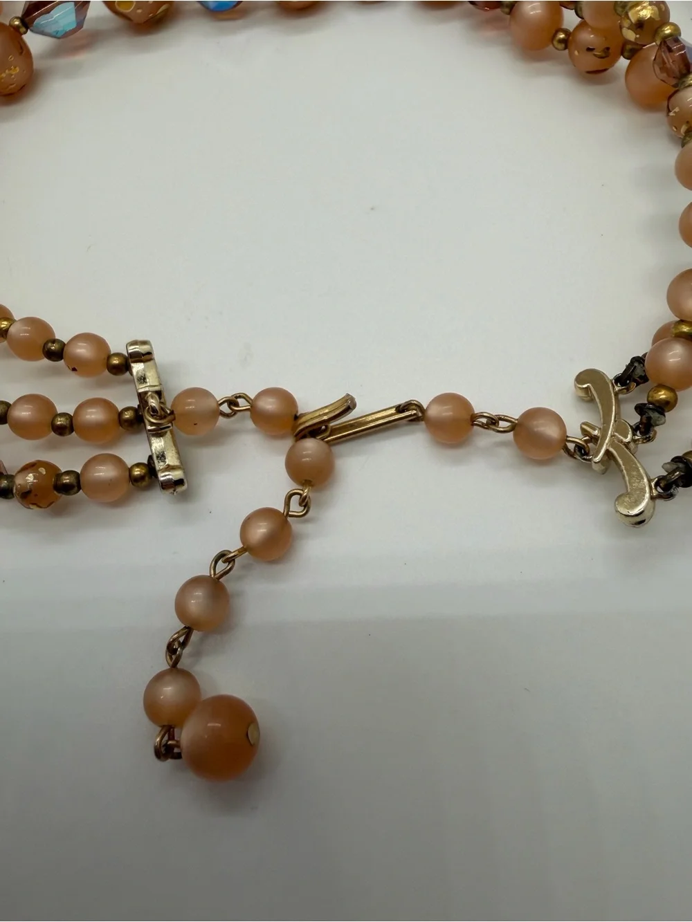 Vintage AB rhinestone and copper color plastic triple layer beaded necklace